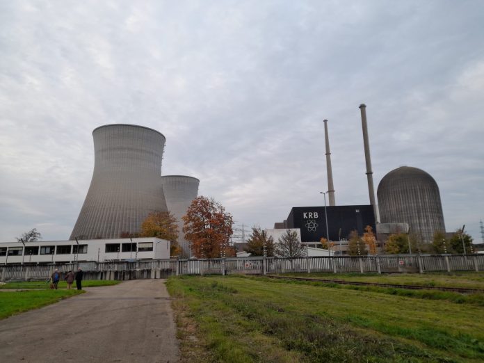 Cooling towers and a reactor containment dome at a nuclear power station