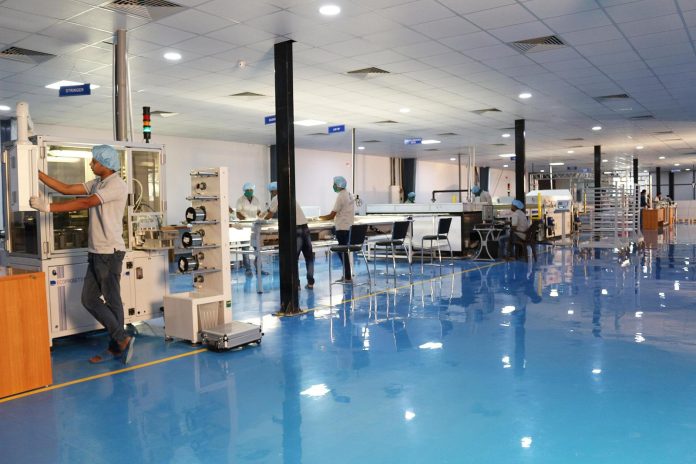 Solar panel manufacturing unit with production line equipment