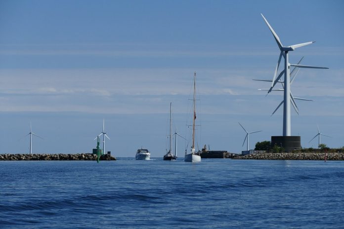 Offshore wind turbines at the Middelgrunden wind farm at sea
