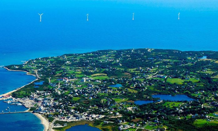 n03-hero Offshore wind turbines operating at sea, seen from the air